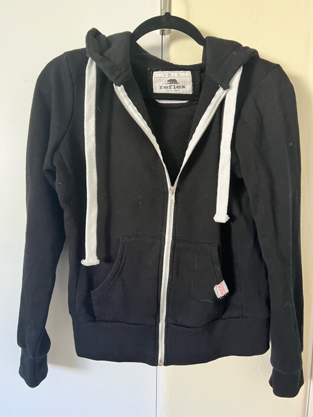 Reflex Black Hoodie with White Label Accent